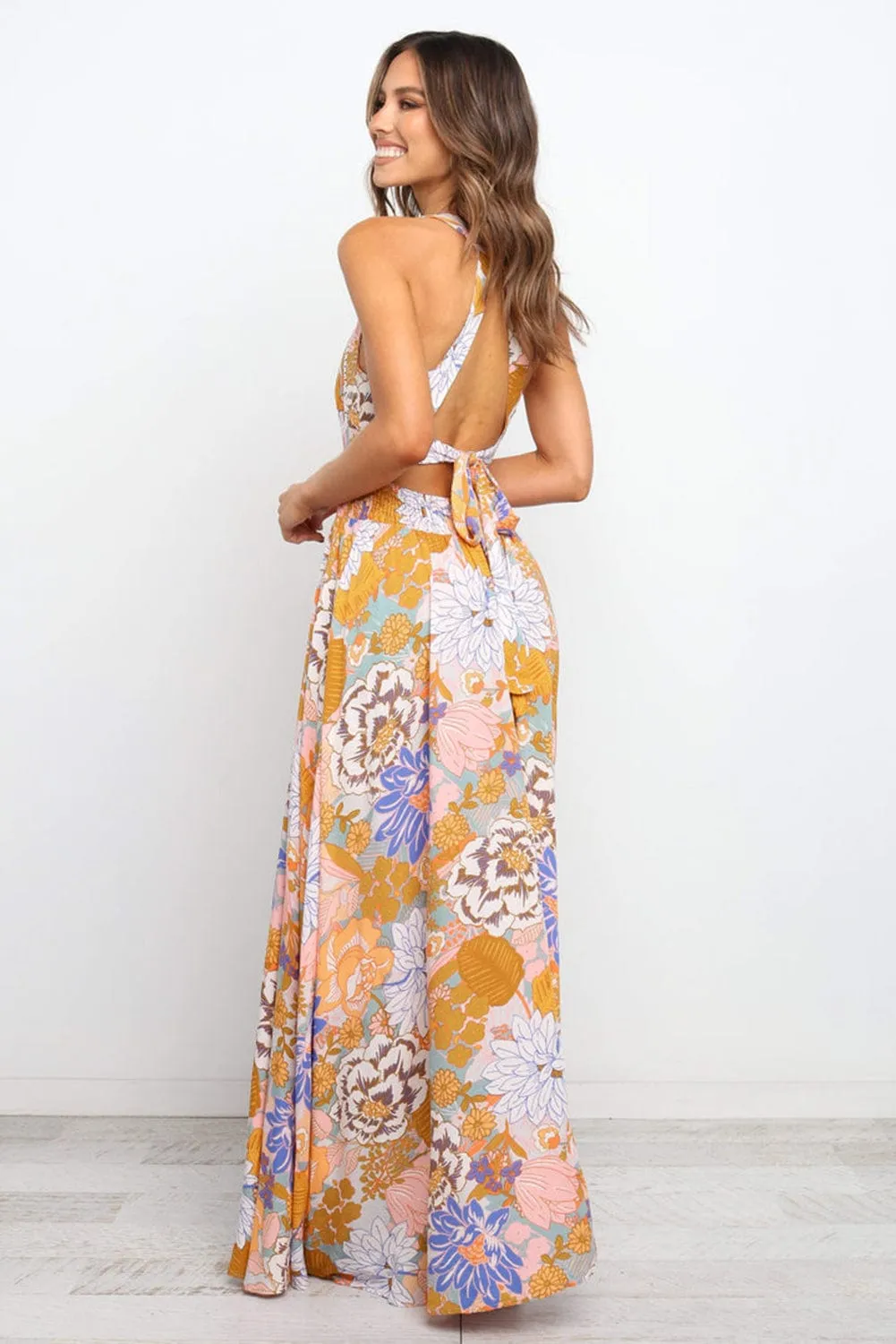 Bohemian Orange Floral Maxi Dress with Backless Detail