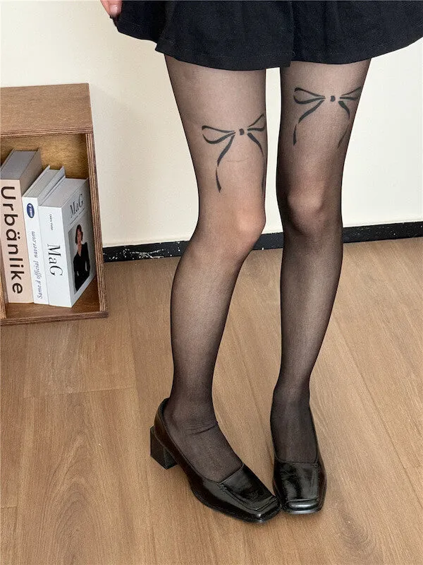 Dollette bow tattoo tights